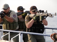 Морские военные конвои и частная морская охрана в защите от морских пиратов. За и против.